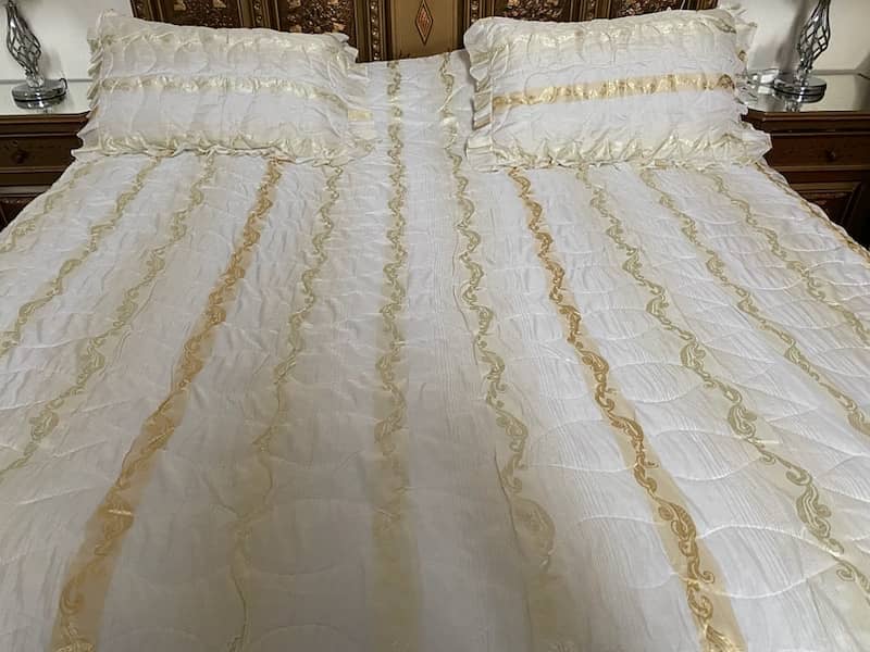 white and golden bedsheet 0