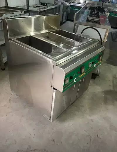 Fryer, Hot plate shawarma counter, Pizza oven Working table. 4