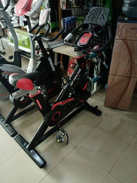 slimline spinning bike gym and fitness machine 1