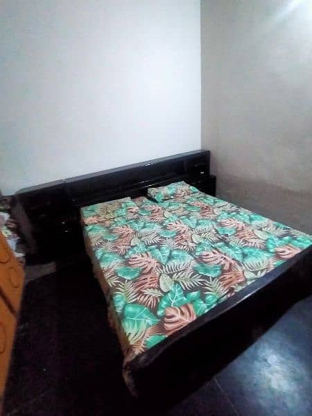 A bed with two side table, 0