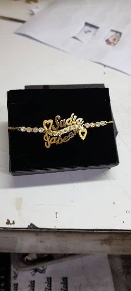 customizer beautiful gold plated name locket. 7
