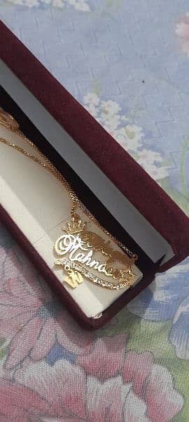 customizer beautiful gold plated name locket. 10