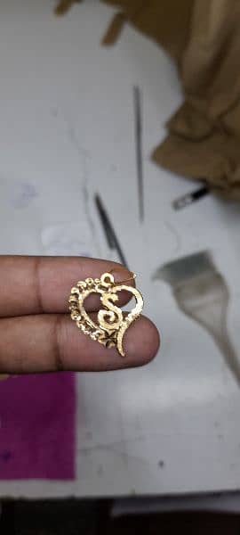 customizer beautiful gold plated name locket. 16