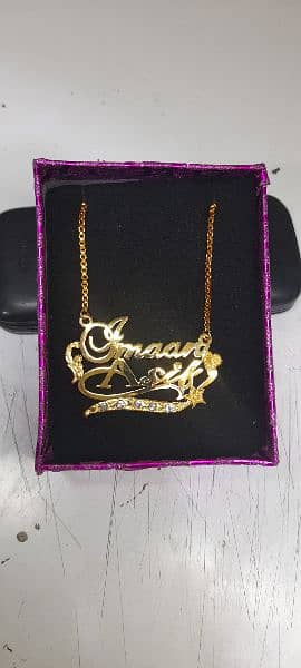 customizer beautiful gold plated name locket. 19