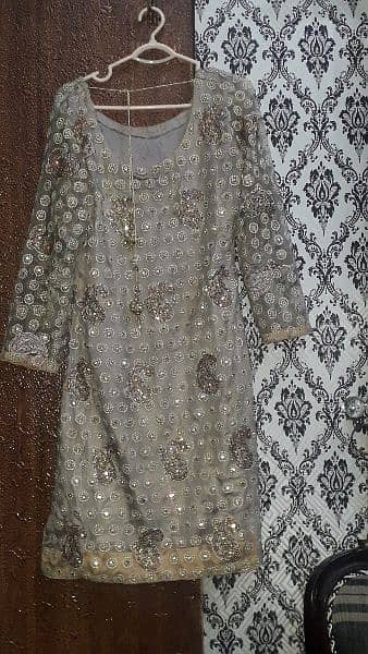 Beautiful fancy net dress with full embroidery 2