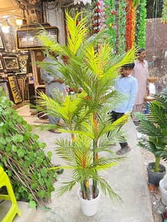 Natural looking artificial and washable palm plant