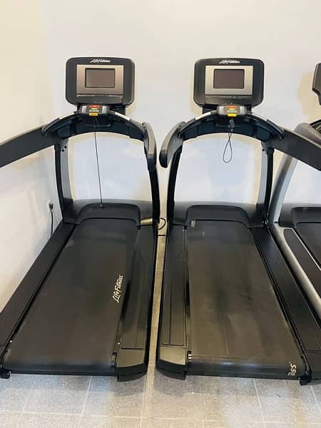 life fitness treadmill,elliptical,spin bike,recumbent bike available 1