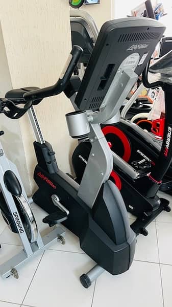 life fitness treadmill,elliptical,spin bike,recumbent bike available 10