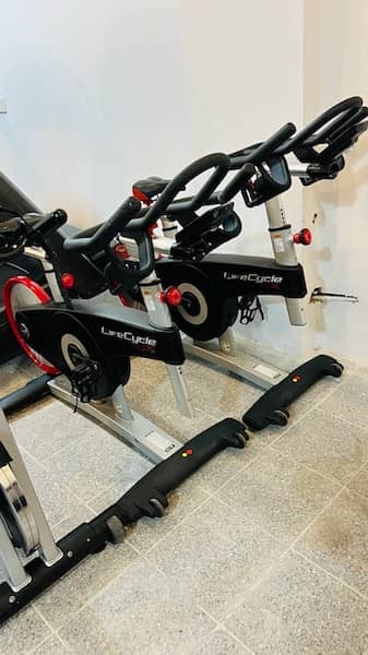 life fitness treadmill,elliptical,spin bike,recumbent bike available 12