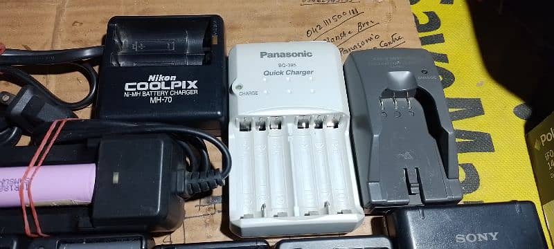All types of camera battery chargers. 3