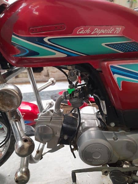 Honda CD 70 2018 model in good condition with original tank and sides 3