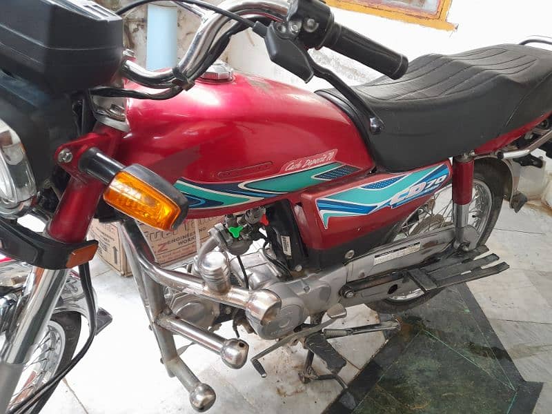 Honda CD 70 2018 model in good condition with original tank and sides 4