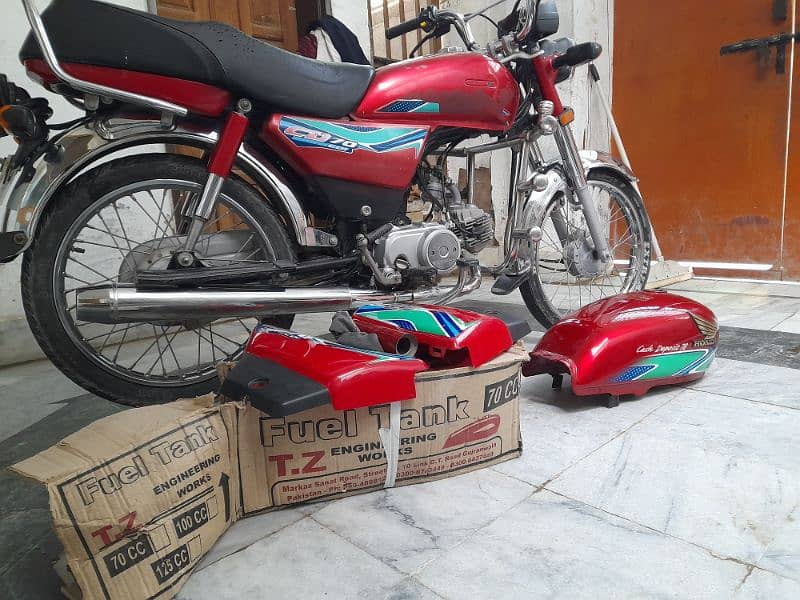 Honda CD 70 2018 model in good condition with original tank and sides 8