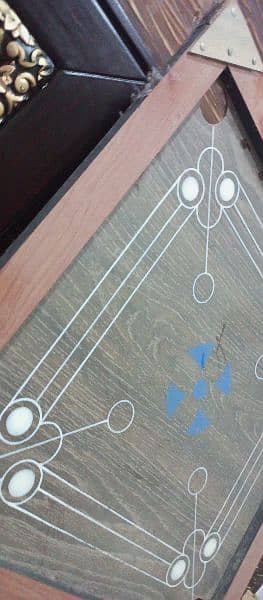small size carrom board new with gotiyan and stager 2