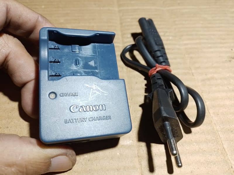 All types of camera battery chargers. 5