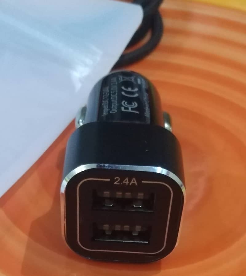 Essager USB Mini Car Charger For All Brands. 1
