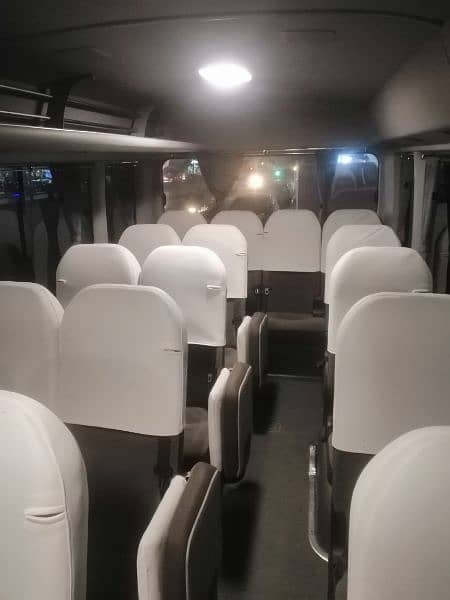 Coaster Saloon and Hiace Grand Cabin for Rent in Lahore 5