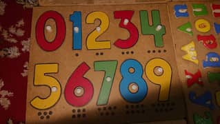 Kids learning wooden puzzles 0