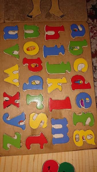 Kids learning wooden puzzles 1