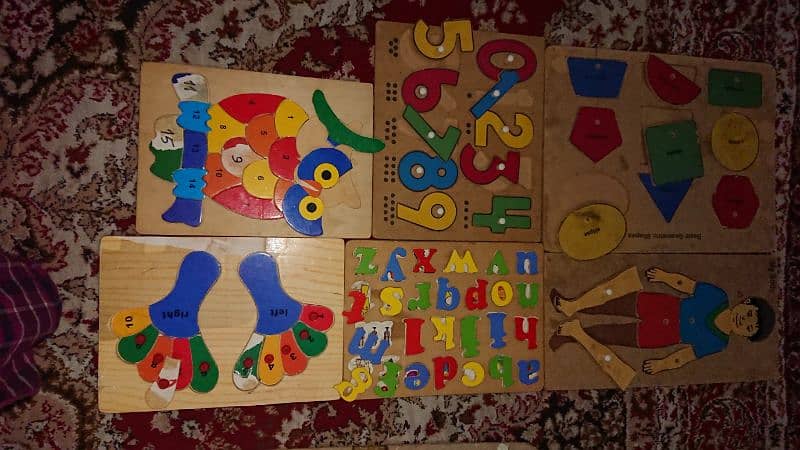 Kids learning wooden puzzles 3