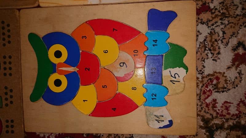 Kids learning wooden puzzles 7