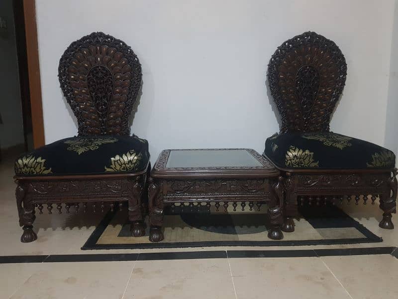coffee table and two chairs 1