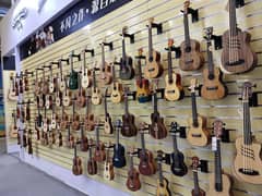 Guitars Violin Ukuleles and Musical instrumnets at happy guitar club
