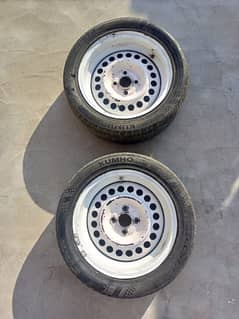 One Pair of Japnesse Tyres along with rims 0