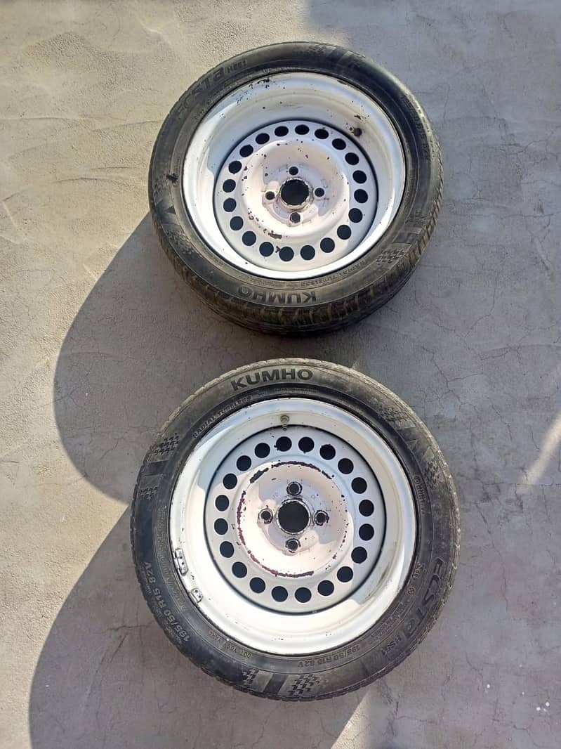 One Pair of Japnesse Tyres along with rims 0