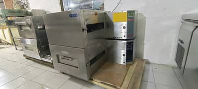 conveyor pizza oven just like  fres import we hve fast food machinery 0