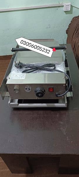 this is burger bun toaster we hve pizza oven fast food machinery 3