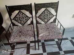 two iron chairs