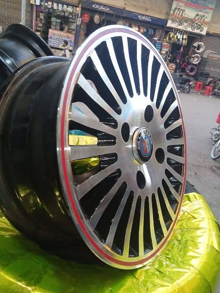 GENUINE ALLOY RIMS FOR COURE AND CHARADE 3