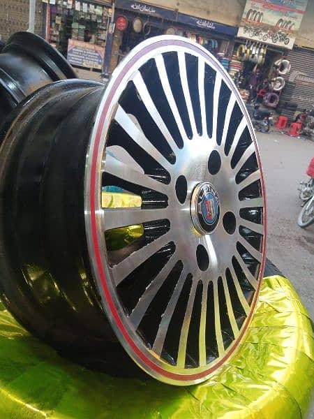 GENUINE ALLOY RIMS FOR COURE AND CHARADE 4