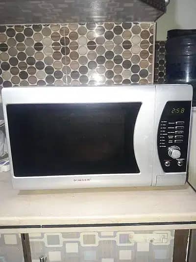 SINGER MICROWAVE OVEN 28 Ltr CONTACT # 0300-3971299 WHAT'S APP 1