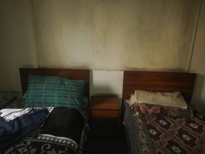 2,4 seater room available  in boys hostel G-9/4