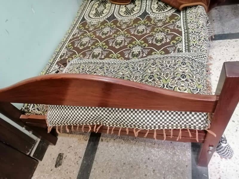 2 single beds with mattress (pure sheesham) 3