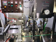 Tetra Pak and Bottle juice Filling Packing Machine in SS Plant