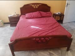 double bed along with side tables