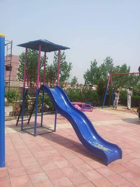 play ground swings and roof parking shade. 2