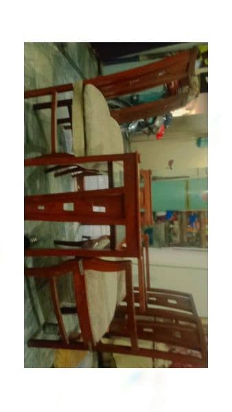 4Seater Dining table 20,,000/- glass top dining table