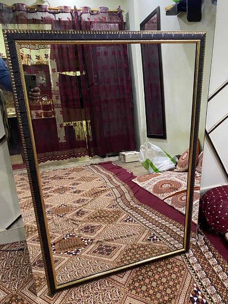 Wall hanging mirror available for sale 0
