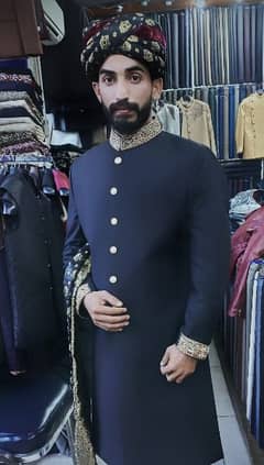 black sherwani, hand work in coller and seleve