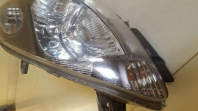 Toyota Passo left Headlight 0