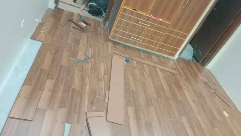 wooden flooring,vinyl flooring,false ceiling,pvc panel,wallpaper,tv 4