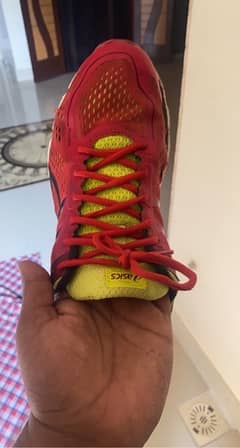 shoes triner akics  red colour 10-9 condition 11 size