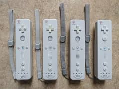 Wii Original White Remotes with Nunchucks