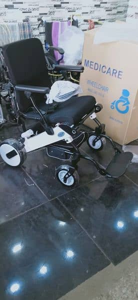 wheelchair electric motorized remote controlled foldable frame battery 1