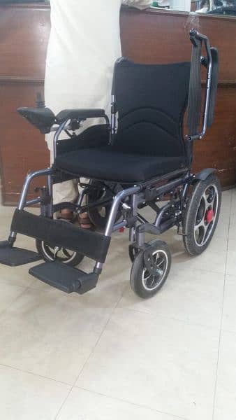 wheelchair electric motorized remote controlled foldable umrah hajj 0