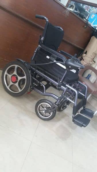 wheelchair electric motorized remote controlled foldable umrah hajj 5